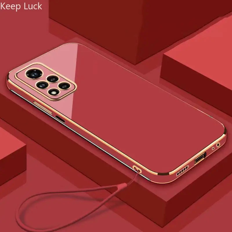 a red iphone case with a gold frame