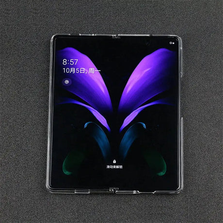 a close up of a phone with a butterfly design on the screen