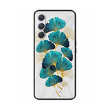 a close up of a phone case with a blue flower on it