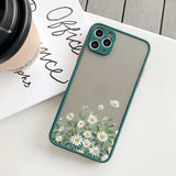 a close up of a phone case with a flower design on it