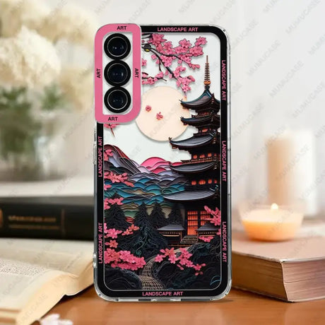 A close up of a phone case with a picture of a pagoda