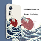 a close up of a phone case with a picture of a wave