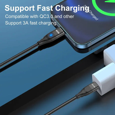 a white cable connected to an iphone