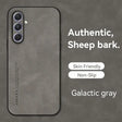 A close up of a phone with a gray background and a text that reads authentic sheep bark