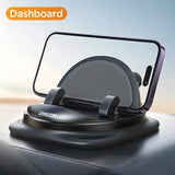 a close up of a phone holder on a car dashboard