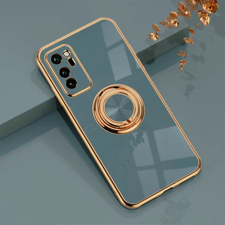 a close up of a phone with a ring on it