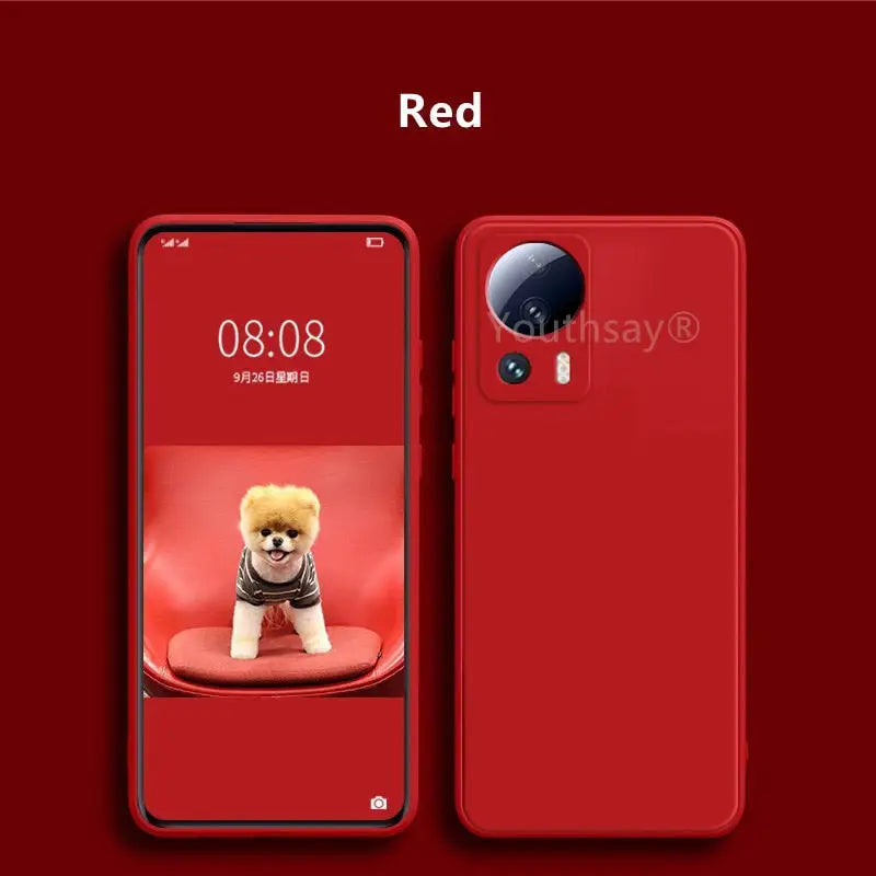 a close up of a red phone with a dog on the screen