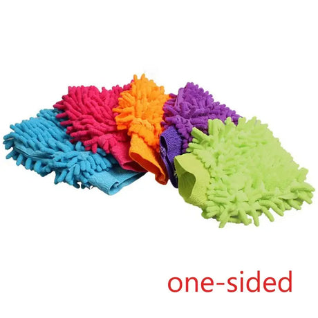 a close up of a pile of colorful cleaning gloves