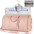 a close up of a pink bag with a hanger and a shirt