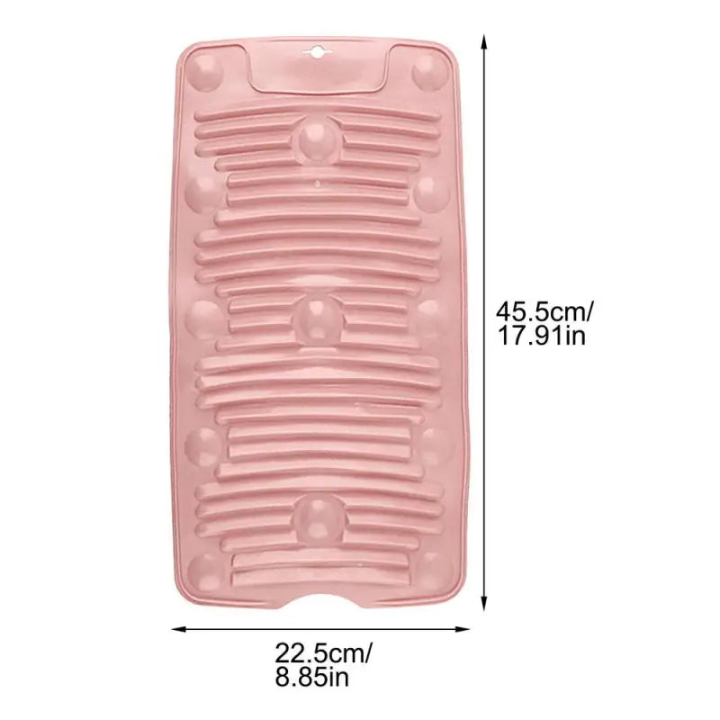 a close up of a pink plastic case with a number of holes