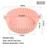 a close up of a pink cupcake pan with measurements