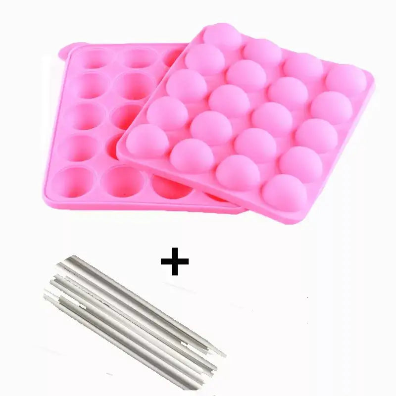 a close up of a pink ice tray with a straw and a straw