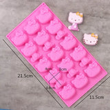 a close up of a pink hello kitty ice tray with a hello kitty figure