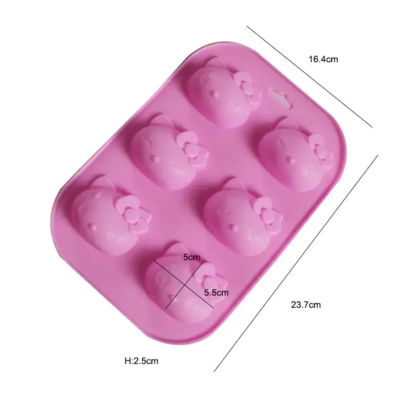 a close up of a pink plastic tray with six heart shaped ice creams