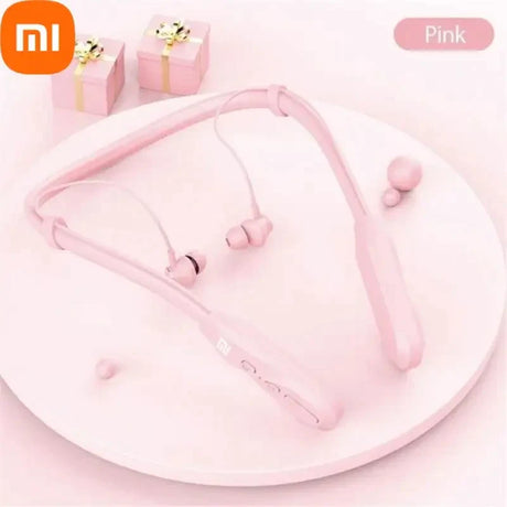 A close up of a pink plate with a pair of earphones