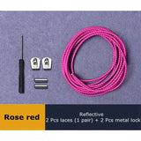 a close up of a pink rope with a pair of scissors