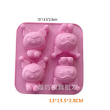 a close up of a pink tray with a bunch of small animals