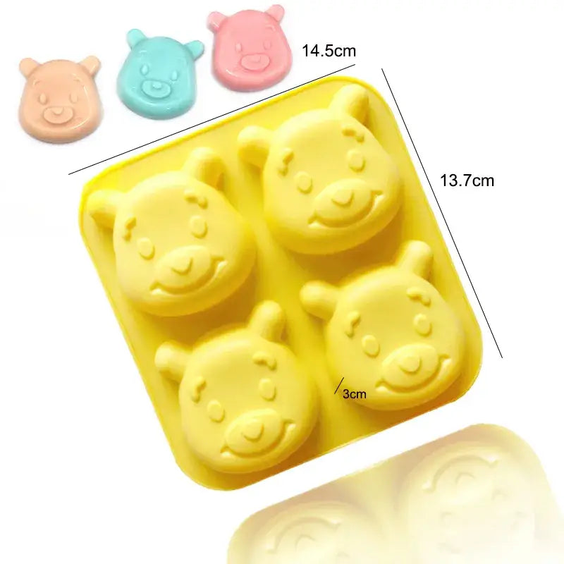 a close up of a plastic tray with four different shaped animals