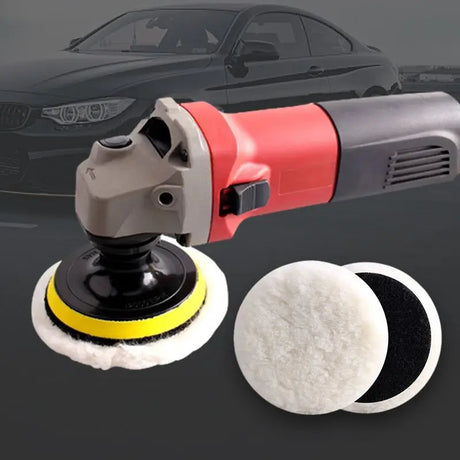 a close up of a car with a polisher and a pad