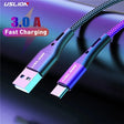 a close up of a purple and blue cable connected to a computer