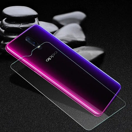 a purple and black phone with a glass screen