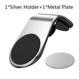 a silver holder with a black and white metal plate