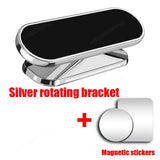 a close up of a silver rotating bracket with magnets