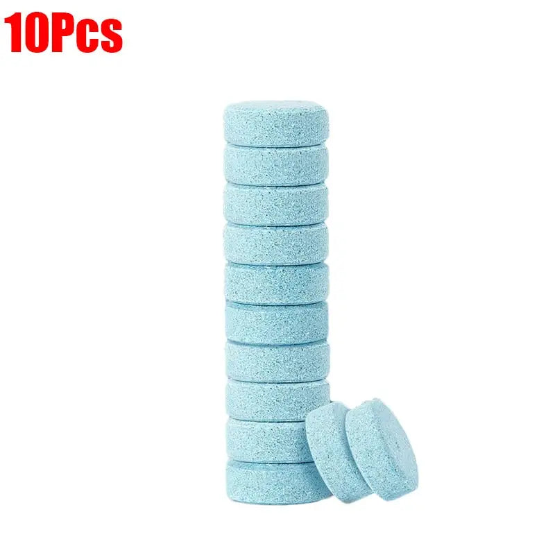 a close up of a stack of blue sponges on a white background