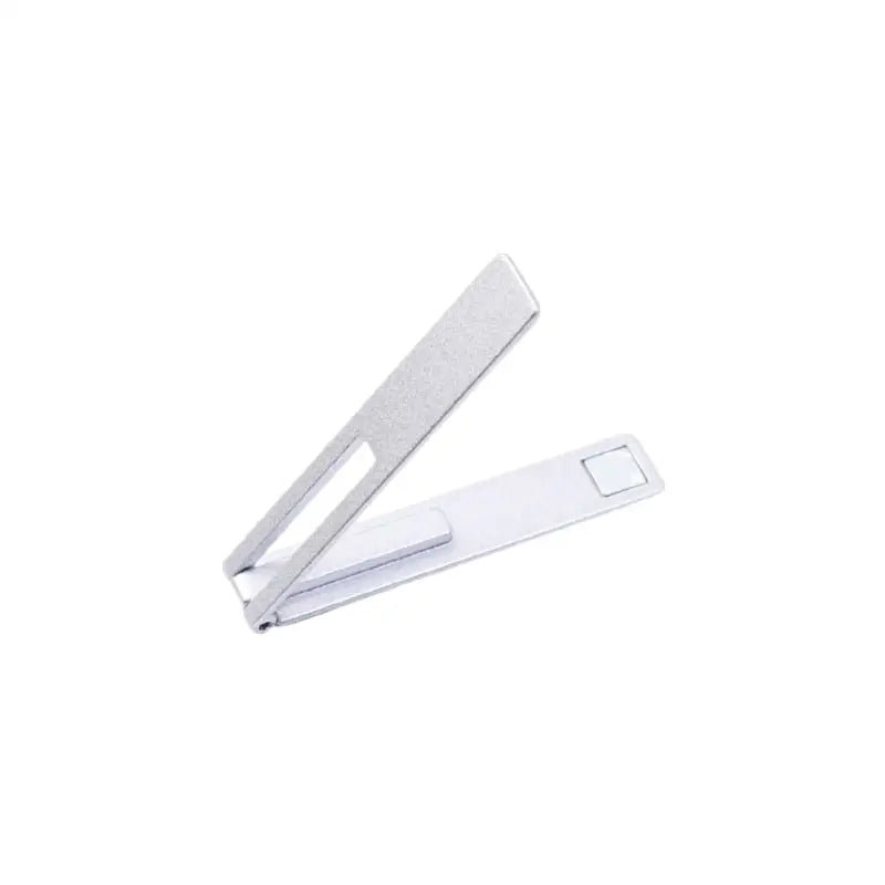 there is a white stapler with a white handle on a white surface