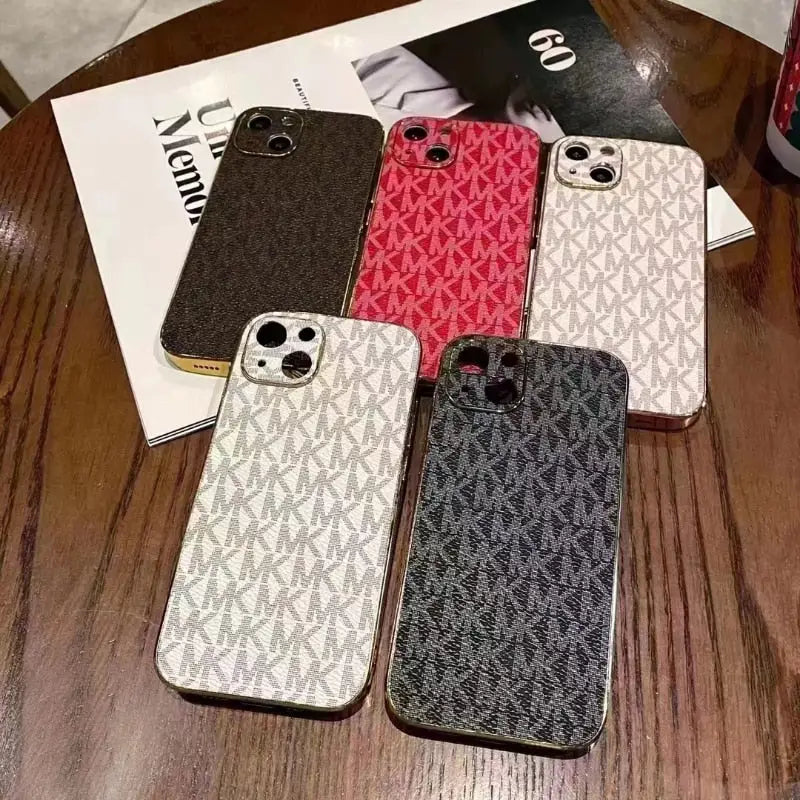 a close up of a table with a bunch of cell phones on it