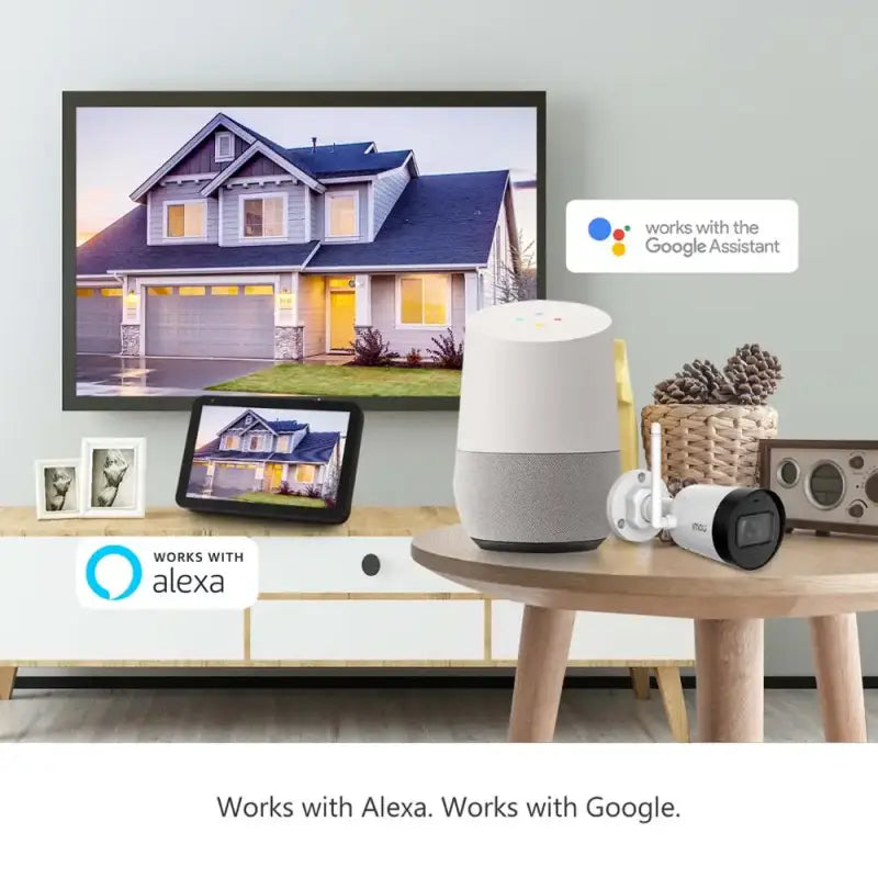 A close up of a table with a tv and a speaker