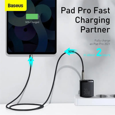 a close up of a tablet with a charging dock attached to it