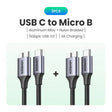 A close up of two cables connected to a usb cable