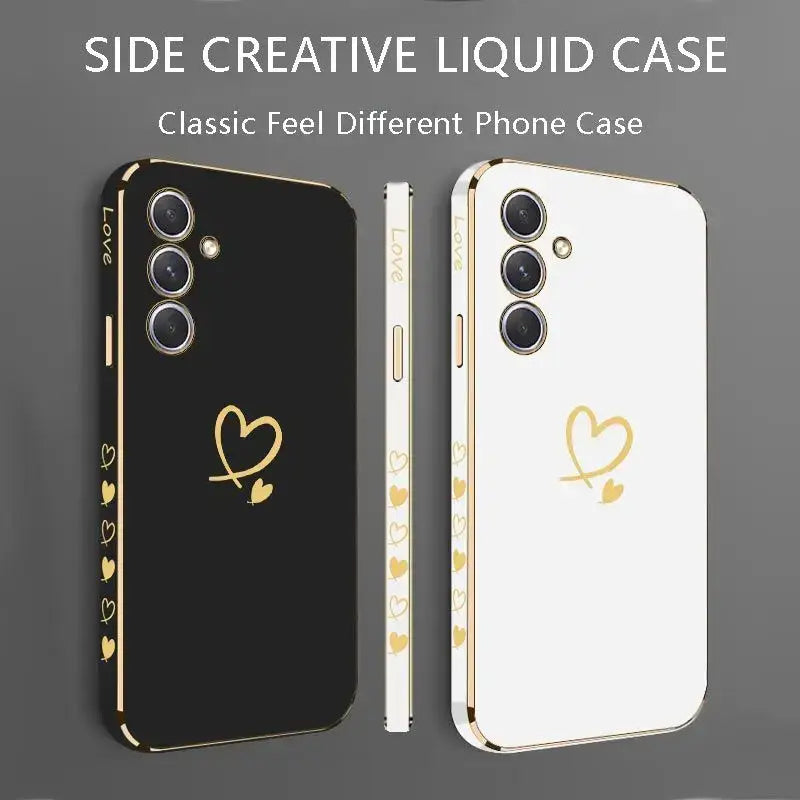 a close up of two cell phones with a gold heart on the back