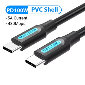 A close up of a usb cable with a blue button on the side