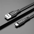 a close up of a usb cable connected to a charger
