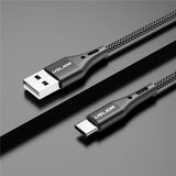 a close up of a usb cable connected to a charger