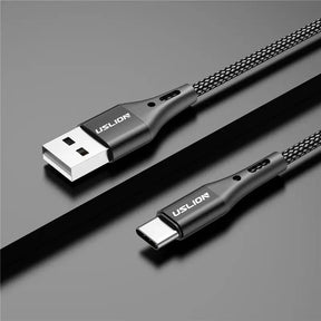 a close up of a usb cable connected to a charger