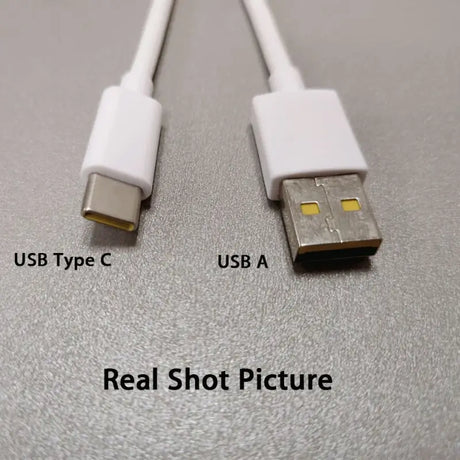 A close up of a usb cable connected to a usb cable