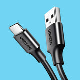A close up of a usb cable connected to a charger