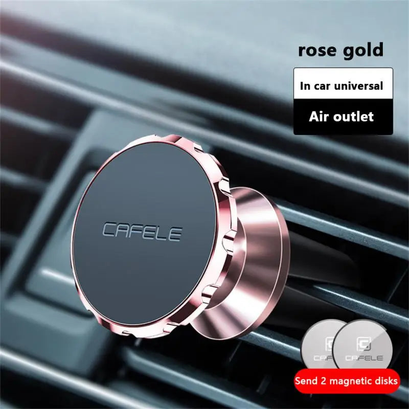 a close up of a car air vent with a rose gold air vent
