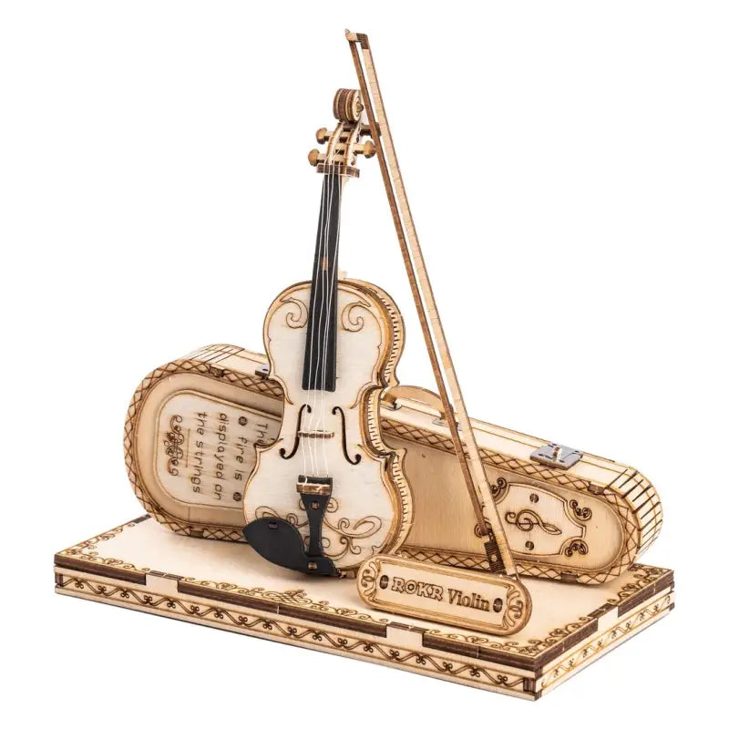 a violin and violin stand on a white background