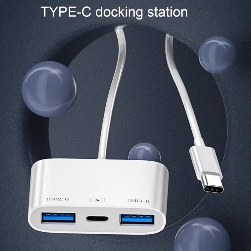 there is a white device with two usb ports connected to it