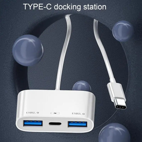 there is a white device with two usb ports connected to it