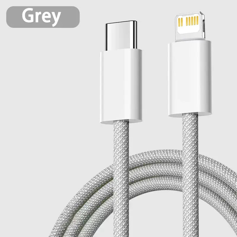 a close up of a white cable connected to a gray phone
