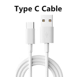 a close up of a white cable connected to a white phone