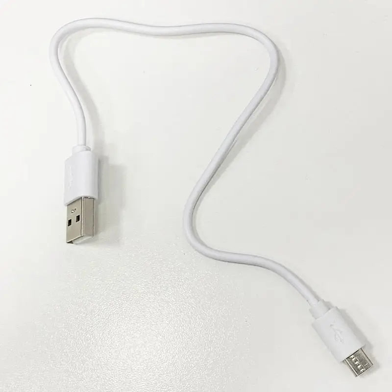 a white usb cable connected to a white iphone