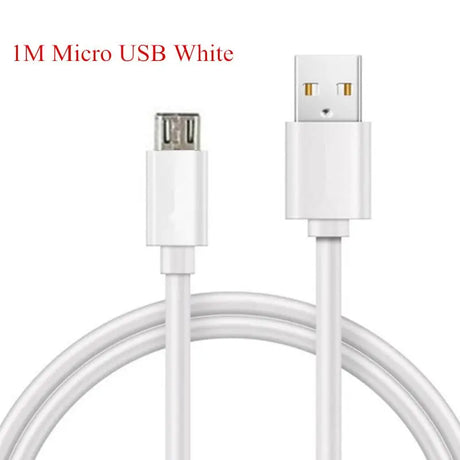 a close up of a white usb cable connected to a white phone