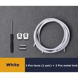 a close up of a white cable and two wires on a table