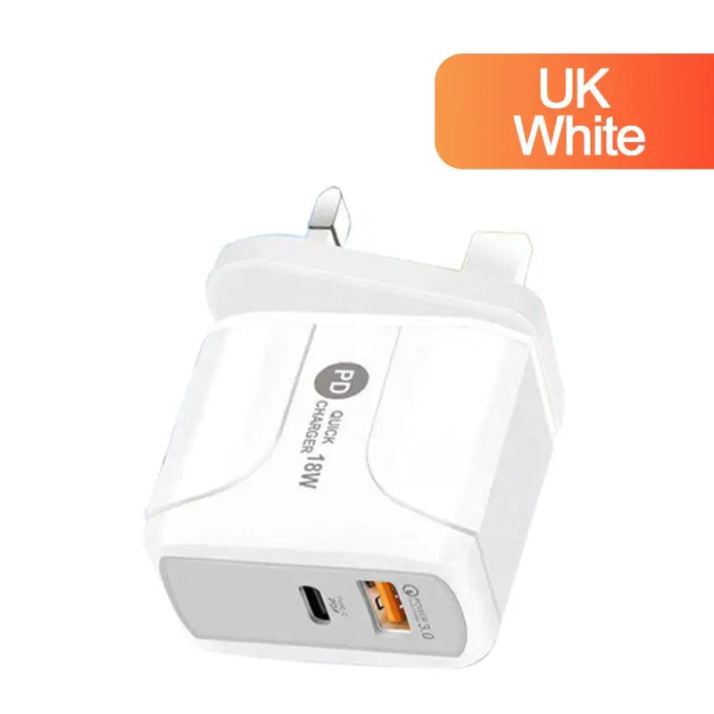 a close up of a white wall charger with a uk white logo